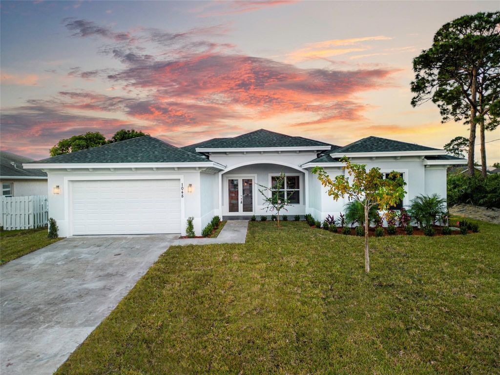 Photo of 1048 SW Paar Drive, Port Saint Lucie, FL 34953 (MLS # F10401919)