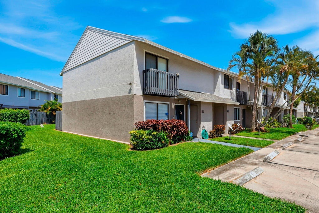 Photo of 2305 Seaside Drive, Greenacres, FL 33463 (MLS # B26052357)