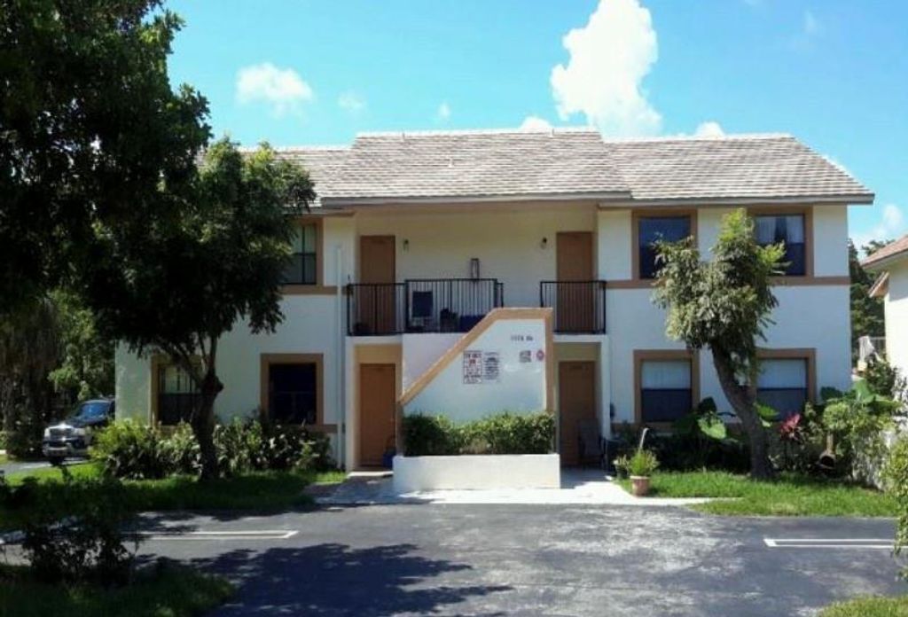 Photo of 1150011506 NW 43RD CT, Coral Springs, FL 33065 (MLS # F10322050)
