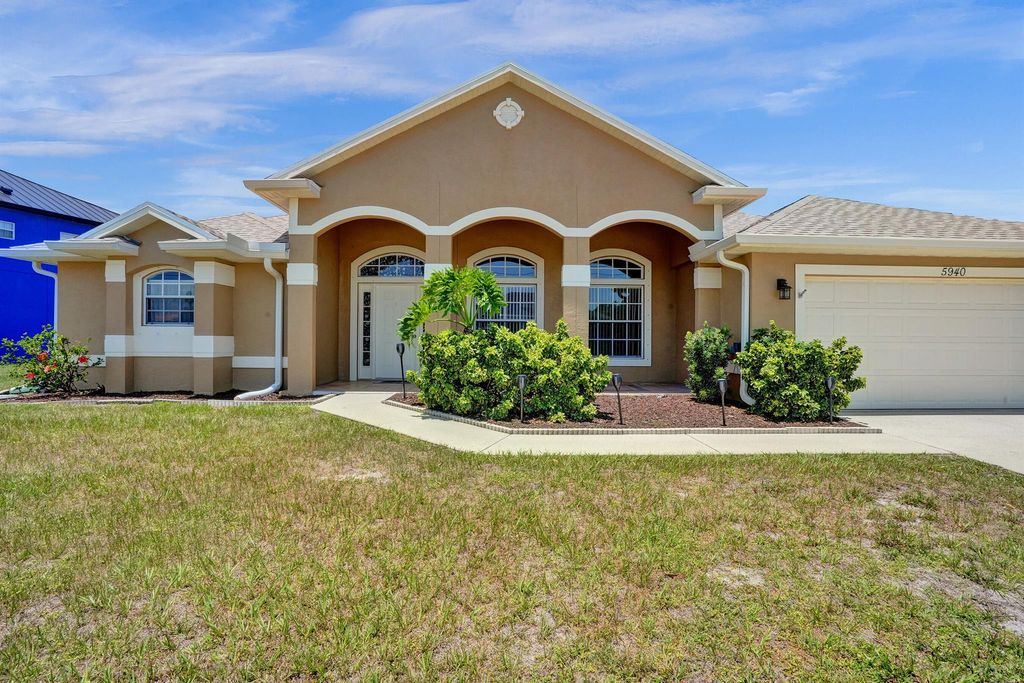 Photo of 5940 NW Center Street, Port Saint Lucie, FL 34986 (MLS # R11093141)