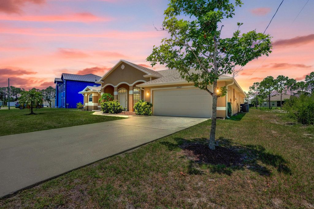 Photo of 5940 NW Center Street, Port Saint Lucie, FL 34986 (MLS # R11093141)