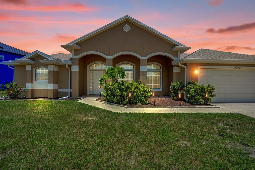Photo of 5940 NW Center Street, Port Saint Lucie, FL 34986 (MLS # R11093141)
