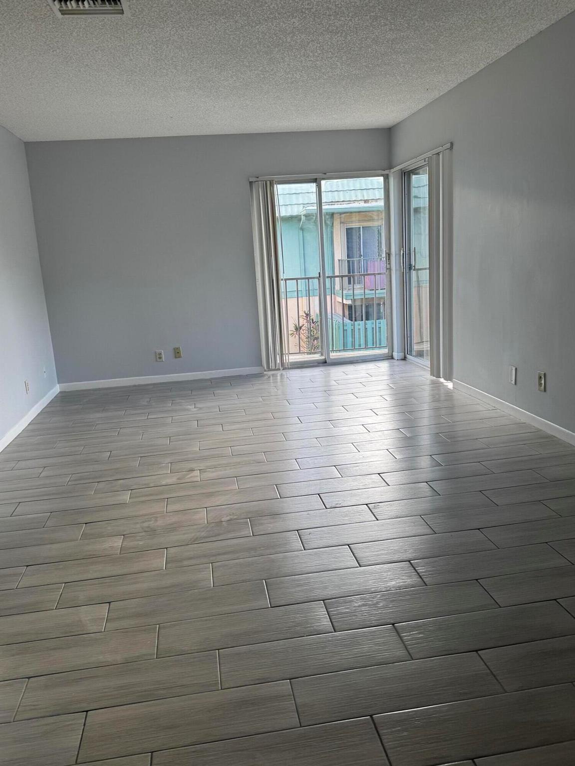 WATER INCLUDED! RENT AND DEPOSIT ONLY!! 2 bedroom 1 1/2 bath in the sought after community of Fairview Villas. 2nd floor . The unit features walk in closet in the master bedroom.. Hurricane shutter. All age community. Close to I95, major roads, shopping and restaurants.