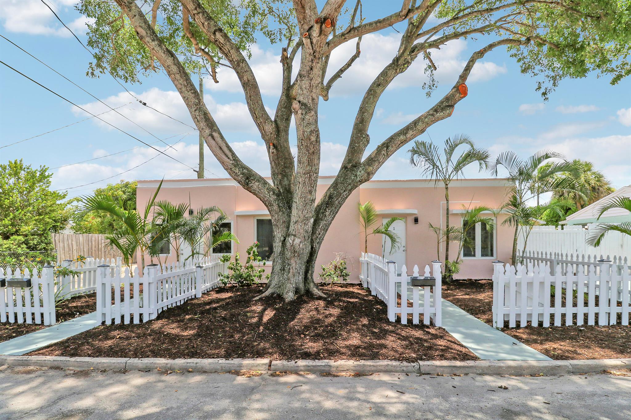 Welcome to this beautiful and fully renovated 2-bedroom, 2-bathroom. located in the heart of Lake Worth Beach, FL! This charming rental is perfect for those who want to live in a modern and stylish space, without sacrificing convenience and comfort. The apartment features brand-new appliances, stunning finishes, and ample natural light throughout. The bedrooms are spacious and cozy, providing the perfect retreat after a long day. The bathrooms are fully updated and includes all the necessary amenities. Plus, with a large fenced yard at your fingertips. also All impact windows and doors for your protection.Don't miss out on this wonderful opportunity to live in one of the most vibrant and charming area's in Florida!