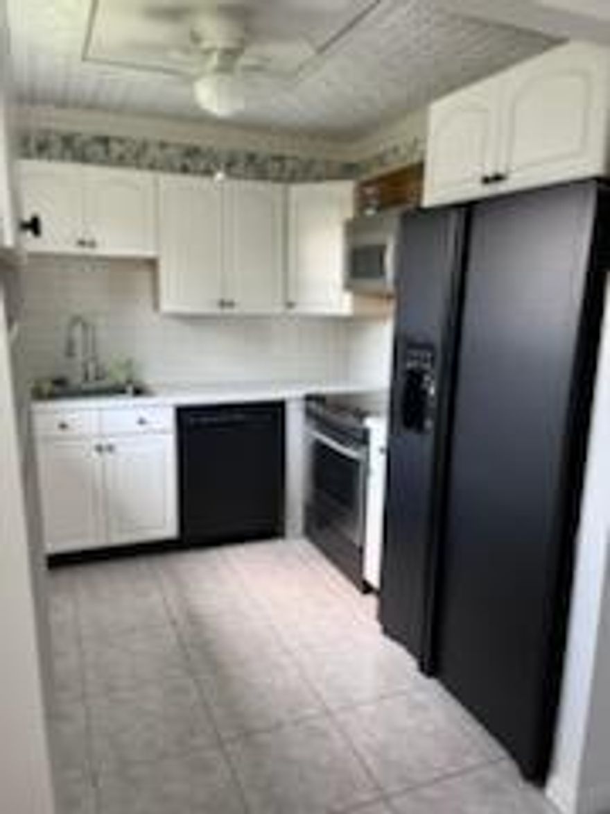 'Back On the Market" This is the least expensive 2 bedroom in Kings Point! Corner unit and upgrades that stand out from the rest! New Water Heater & AC. Beach feel with plantation shutters, The classic ornate ceiling in the kitchen. The only unit with a patio door off the master bedroom. All rooms were upgraded with 6-panel doors with new hardware. New ceiling fans. Newly installed cabinets in both bathrooms along with new sinks and faucets. The patio has windows that allow for all-year-round use. The brand new high-efficiency A/C helps on electric bills. Move-in ready with elevator and comes with/without the furniture. No Minimum Credit Score Required, and ok to lease after the 2nd year.