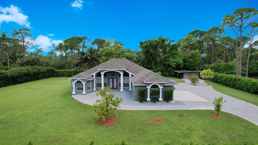 Photo of 15858 66th Court N, Loxahatchee, FL 33470 (MLS # R10813962)