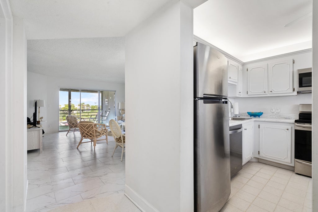 Photo of 3590 Via Poinciana #607, Lake Worth, FL 33467 (MLS # R11122398)