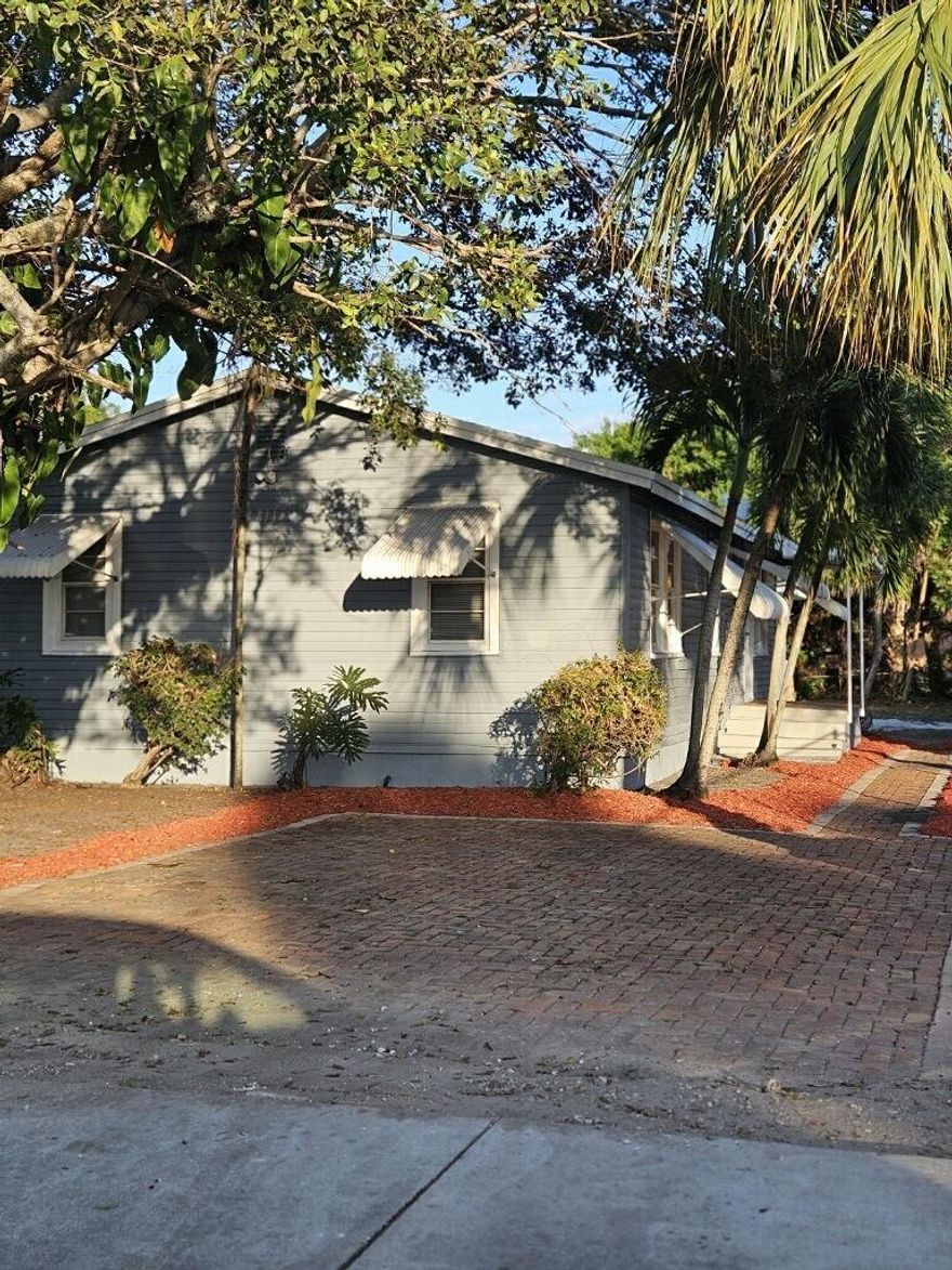 Discover the charm of East Delray living in this inviting 3-bedroom, 1.5-bath single-family home, perfectly situated just minutes from the beach and the vibrant shops and restaurants of Atlantic Avenue.Step inside to find a bright and welcoming layout, with an open living and dining area ideal for entertaining. . Three comfortable bedrooms provide flexibility for family, guests, or a home office, while the updated 1.5 baths add convenience and style. Roof was replaced in 2020 and home features central AC and tankless water heater.A second structure in the back was originally a storage shed has been equipped with AC and could be used as a guest room or home office