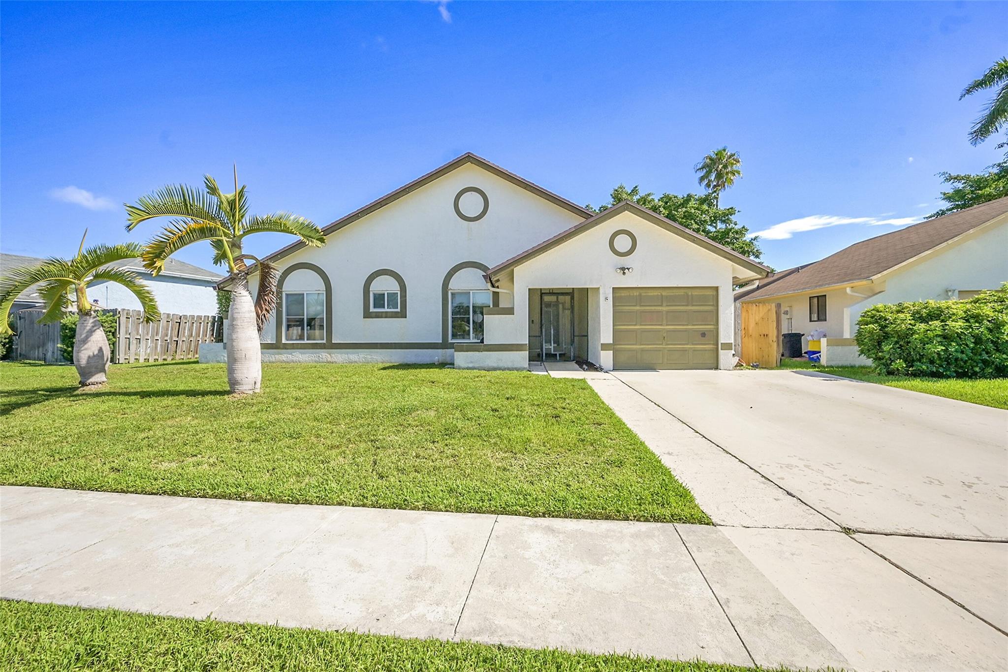 Welcome to this charming 3 bedroom, 2 bathroom home in the desirable Boca Winds Community. Bright and inviting, the home features impact windows and doors throughout, offering security and peace of mind. Inside, enjoy the warmth of wood laminate flooring and an open layout filled with natural light thanks to its coveted southern exposure. The spacious living areas flow seamlessly to the outdoors, where a private pool and patio create the ideal space for entertaining or relaxing in the Florida sunshine. Boca Winds is known for its excellent schools, community amenities, and convenient location close to shopping, dining, and parks. This home combines comfort, style, and location—everything you need for the perfect Boca lifestyle!