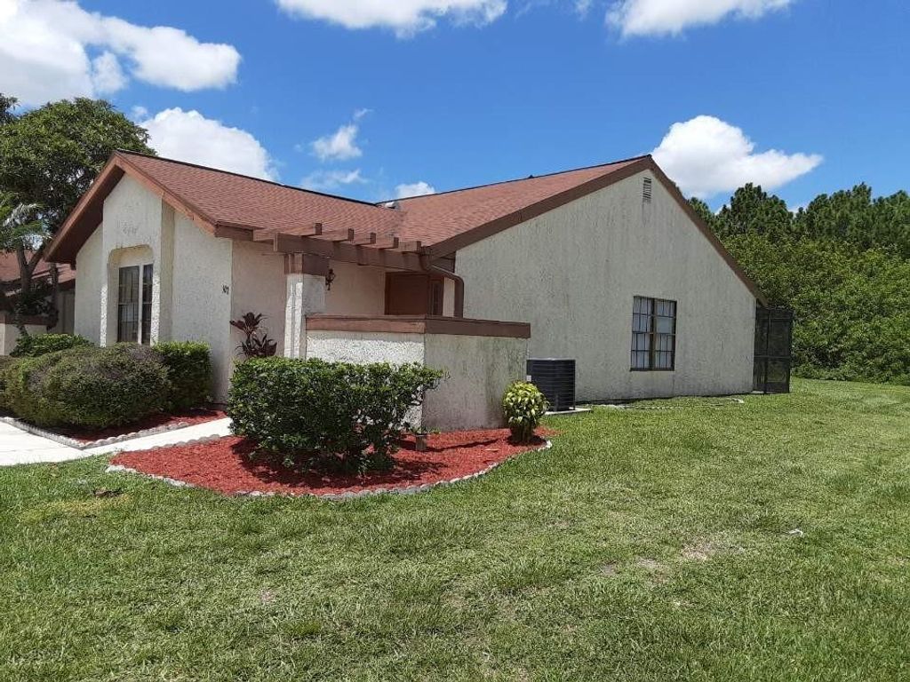 Photo of 441 SW BILL TRAITEL AVENUE, Port Saint Lucie, FL 34953 (MLS # F10252991)