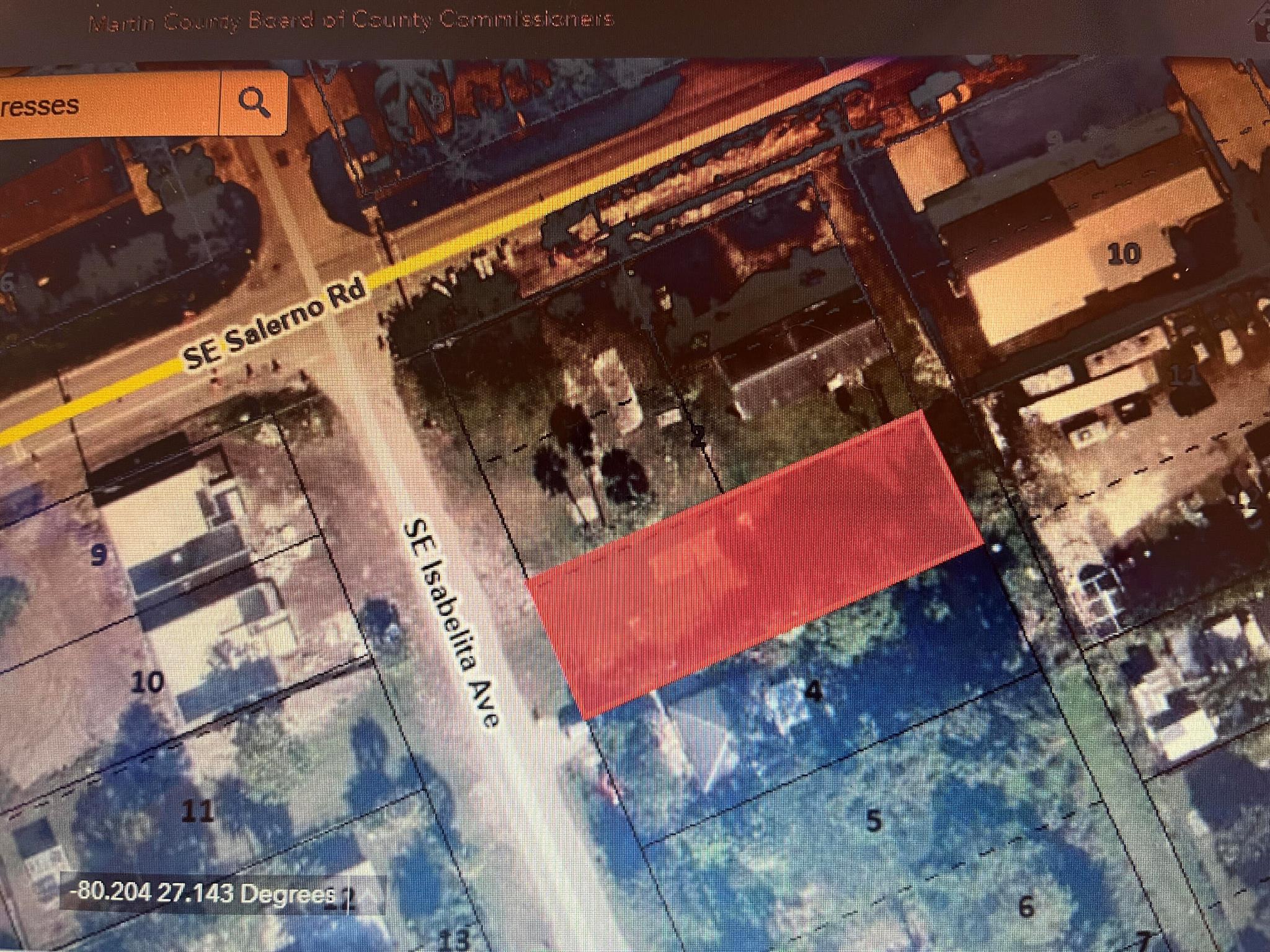 This vacant lot has a well and septic tank. Also a concrete pad that measures approx 50 x 150. Recommend you check with Martin County Growth Management for the permitted usages for a home, or modular home and or mobile home.