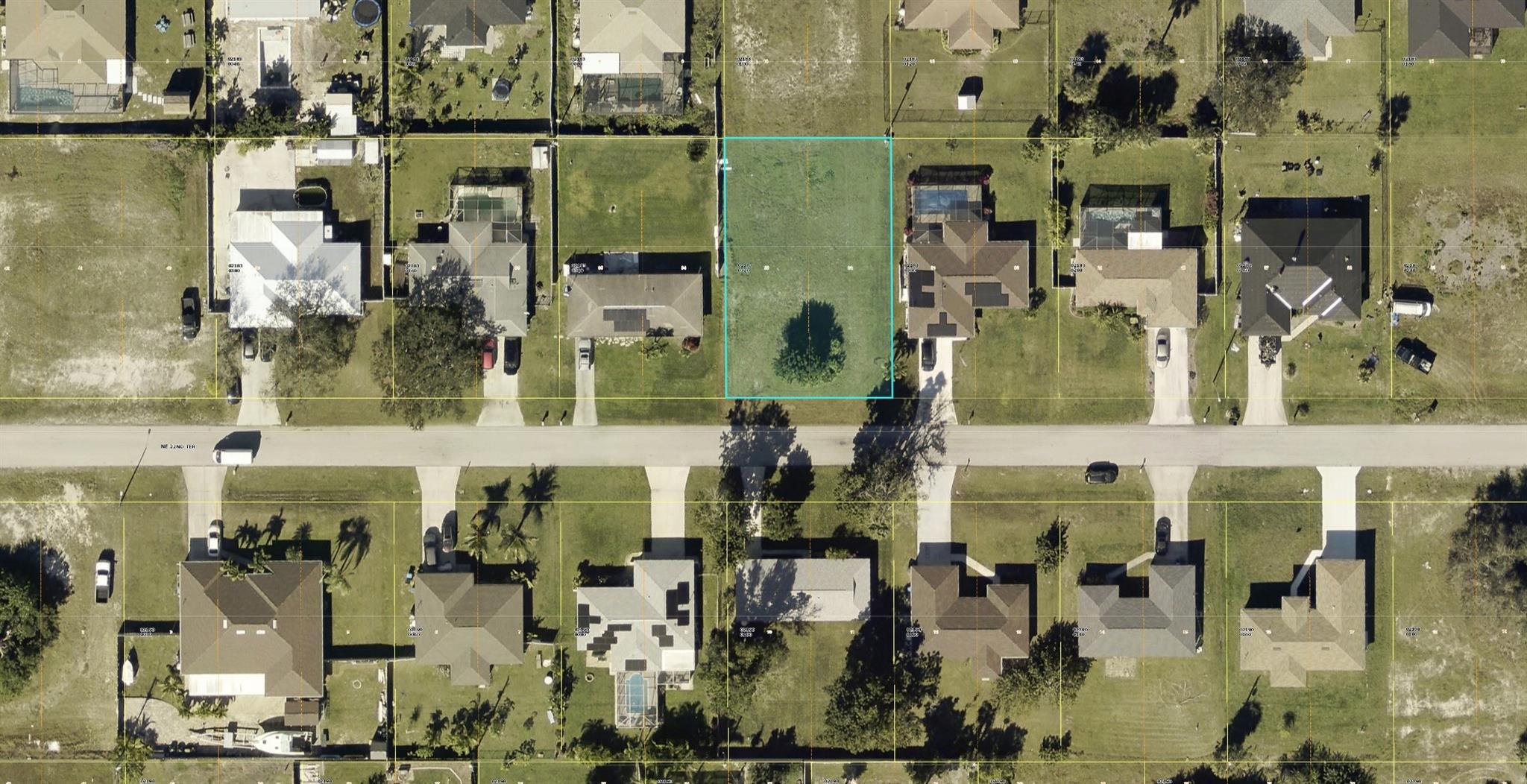 The property at 1805 NE 22nd Terrace, Cape Coral, FL 33909, is a 0.23-acre vacant residential lot. It is situated in a desirable neighborhood with easy access to nearby schools and amenities. The lot size is approximately 10,019 square feet, and it is zoned for single-family residential use, making it suitable for building your dream home or an investment property. The area features a growing community with proximity to major roads and shopping areas ( OWNER FINANCING AVAILABLE)