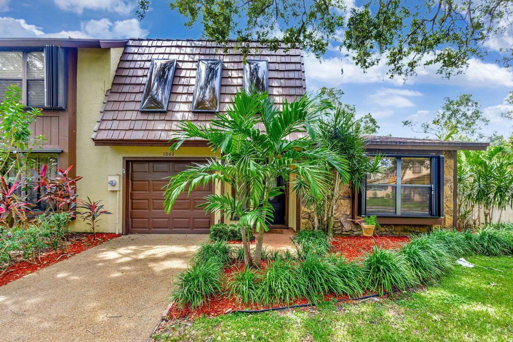 Photo of 1066 Raintree Lane, Palm Beach Gardens, FL 33410 (MLS # R11024538)