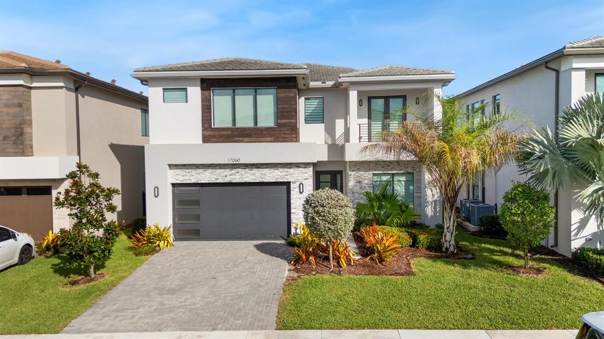 Welcome to this stunning Mariana model in the sought-after community of Lotus! This 5-bedroom, 5-bathroom home combines luxury and comfort with designer upgrades and an open, spacious layout. The fenced backyard offers beautiful water views and plenty of room to add your dream pool. Perfect for families, the home sits on a quiet street in a gated community with top-notch security. Enjoy resort-style amenities including a modern clubhouse, fitness center, pools, and sports courts. With stylish finishes, generous living spaces, and a peaceful setting, this home has everything you need for relaxed, elegant living.