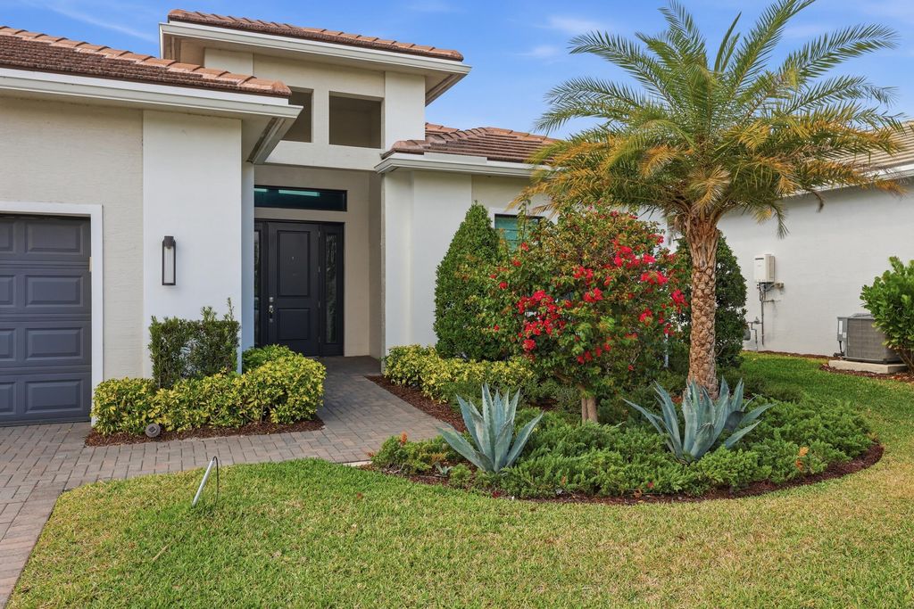 Photo of 5395 Saint Vincent Lane, The Acreage, FL 33470 (MLS # R11168608)