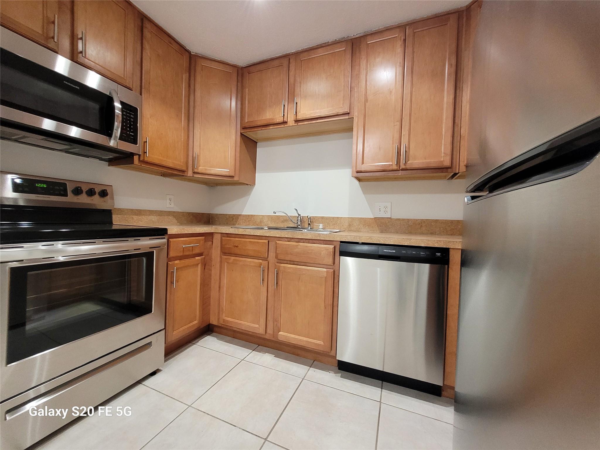 This is a 2-bedroom, 1-bathroom apartment located on the second floor. The unit features new appliances including a washer and dryer. The apartment is situated in a convenient location in Coral Springs, Florida. The building is well-maintained and has a modern look. The apartment is spacious and has plenty of natural light. The kitchen is equipped with modern appliances. The bathroom is clean and well-maintained. The apartment is perfect for anyone looking for a comfortable and convenient living space. There are several schools in the vicinity of the apartment. Some of the notable ones include Maplewood Elementary School, and Coral Springs Middle School1. There are also several shopping centers , including Coral Square Mall and The Walk of Coral Springs1.