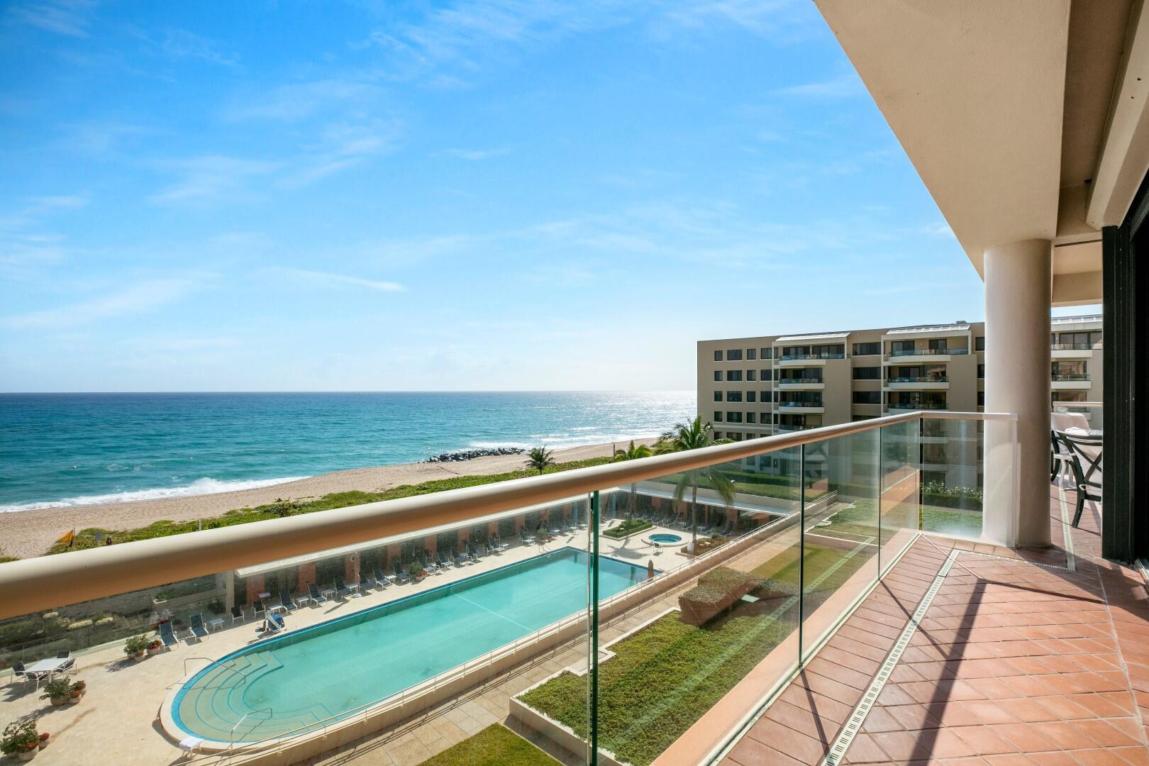 Oceanfront Breakers Row 2BR/2.1BA plus library condominium with poolside cabana. Beautiful corner unit features spacious and light filled great room with floor to ceiling windows. Multiple open balconies and a fantastic covered balcony with incredible sunrise, ocean, and pool views. Additional highlights include large owner's suite, kitchen with butler's pantry, and laundry room. Two North Breakers Row is a full service building with on-site manager, manned guard house, resort style pool area, Pilates room, and weight training room.