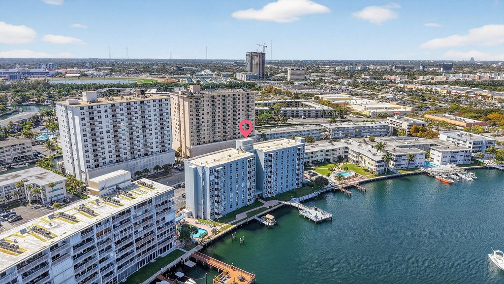 Photo of 430 Golden Isles Drive #301, Hallandale Beach, FL 33009 (MLS # B26019706)