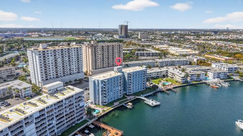 Photo of 430 Golden Isles Drive #301, Hallandale Beach, FL 33009 (MLS # B26019706)