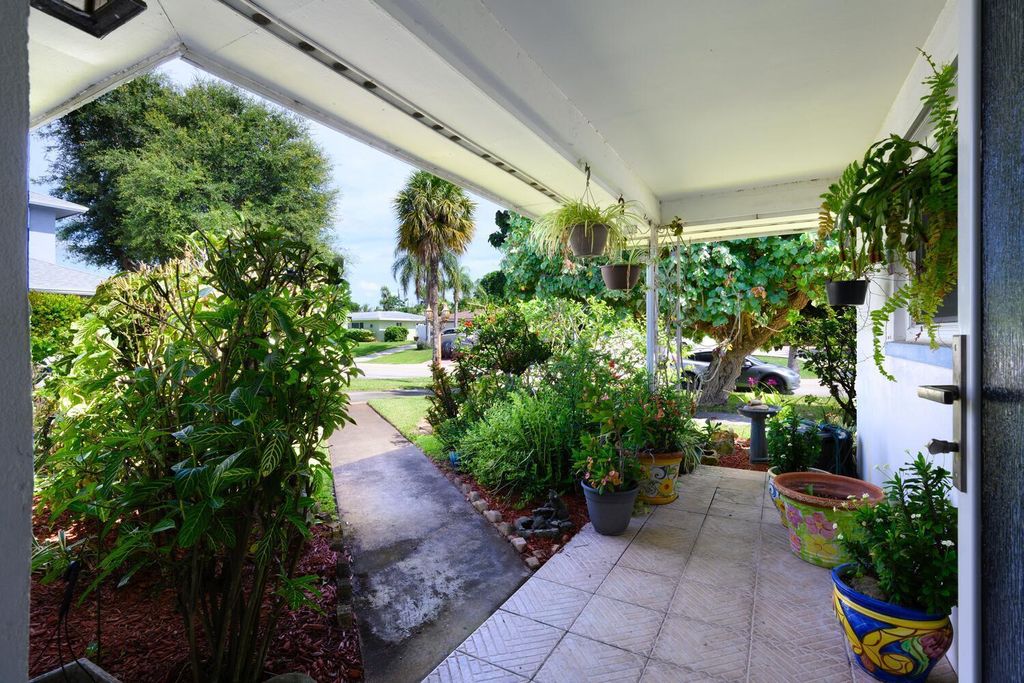 Photo of 3884 Lighthouse Drive, Palm Beach Gardens, FL 33410 (MLS # R11110975)