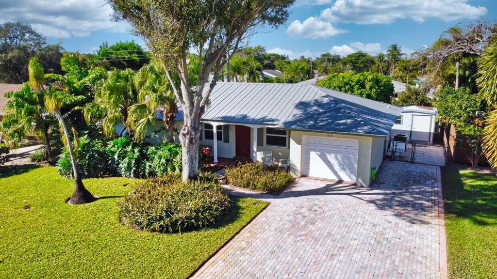 Photo of 1609 Berkshire Avenue, Jupiter, FL 33469 (MLS # R10857802)