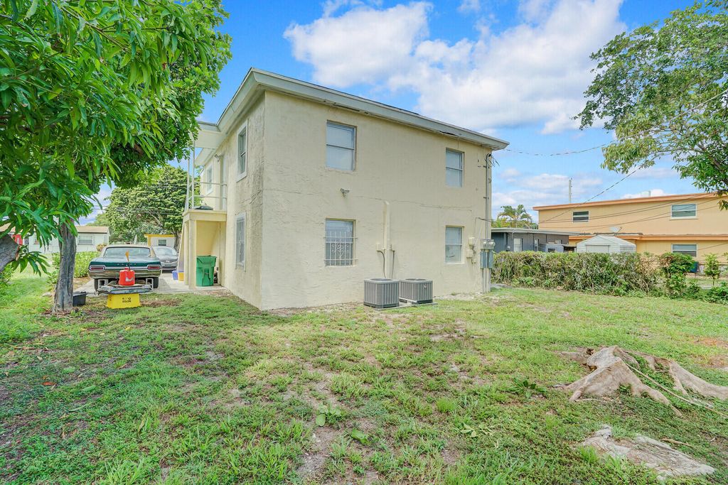 Photo of 1225 W 10th Street #Apartment B, Riviera Beach, FL 33404 (MLS # B26027171)
