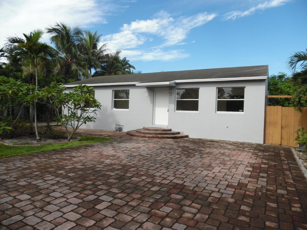 Photo of 1205 Mathis Street, Lake Worth Beach, FL 33461 (MLS # B26078281)