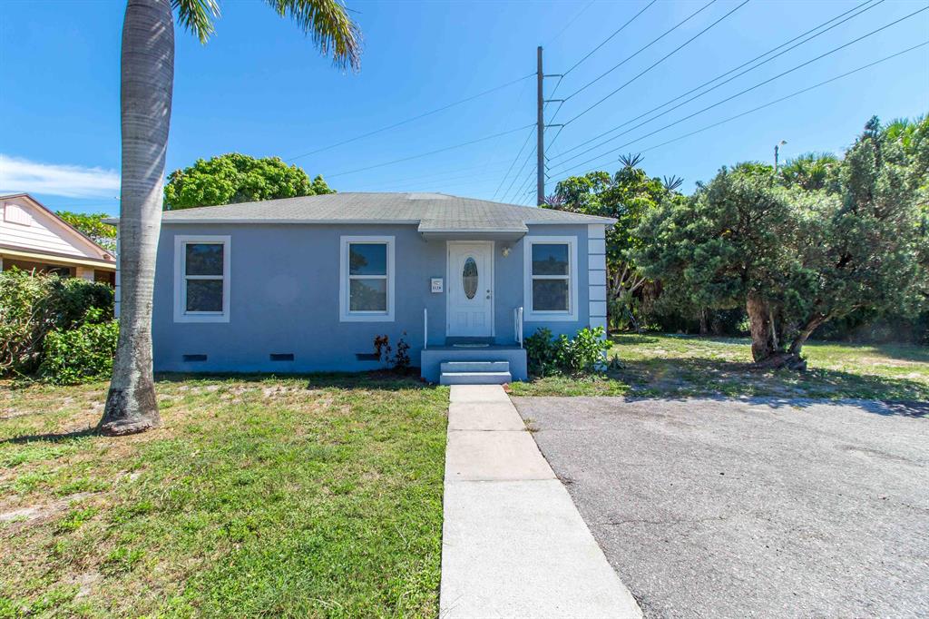 Photo of 1128 Van Deventer Street St, West Palm Beach, FL 33405 (MLS # R10830147)