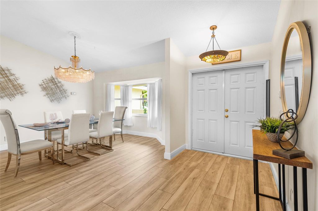 Photo of 5069 NW 87th Terrace, Coral Springs, FL 33067 (MLS # F10459847)