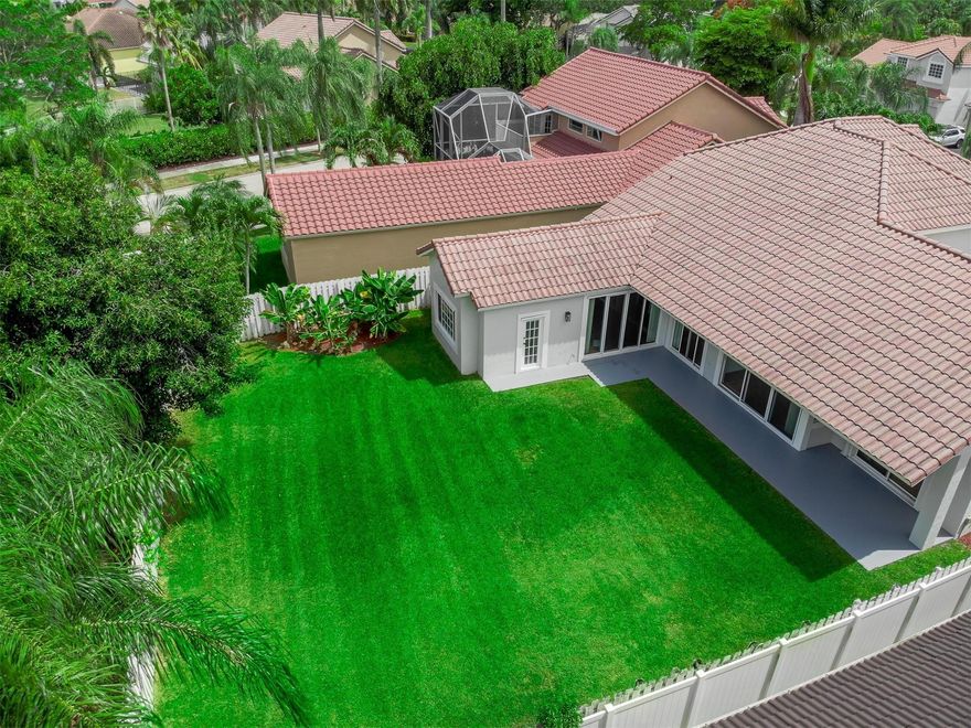 LOWEST PRICE FOR a 5/3 with LARGEST LOT in all Weston! Shows like a model w/ all NEW MODERN UPDATES! Light, bright, airy, meticulous, almost 1/4 ACRE w/PRIVATE FENCED YARD, generous covered patio. 1st Floor has primary suite + 5th BD, ideal as den/nursery; 2nd Floor w private 3BD kids' wing. NEW UPDATES incl STUNNING white quartz kitchen w/high-end stainless appl (Oct 2024), 3 NEW updated bathrooms (July 2025), $25K all NEW permitted plumbing re-pipe (Nov 2024), NEW paint in/out, NEW LED & modern light fixtures, 2024 water heater, new sprinklers & timer, new laundry sink w/high-end W/D. Oversized 2CG w/bike storage, TESLA charger, Trane AC w/Smart thermostat, hurricane accordions + panels. MOST BEAUTIFUL BOUTIQUE COMM, gated, steps to lakefront clubhouse w pool/spa/ball court. TOP SCHOOLS!