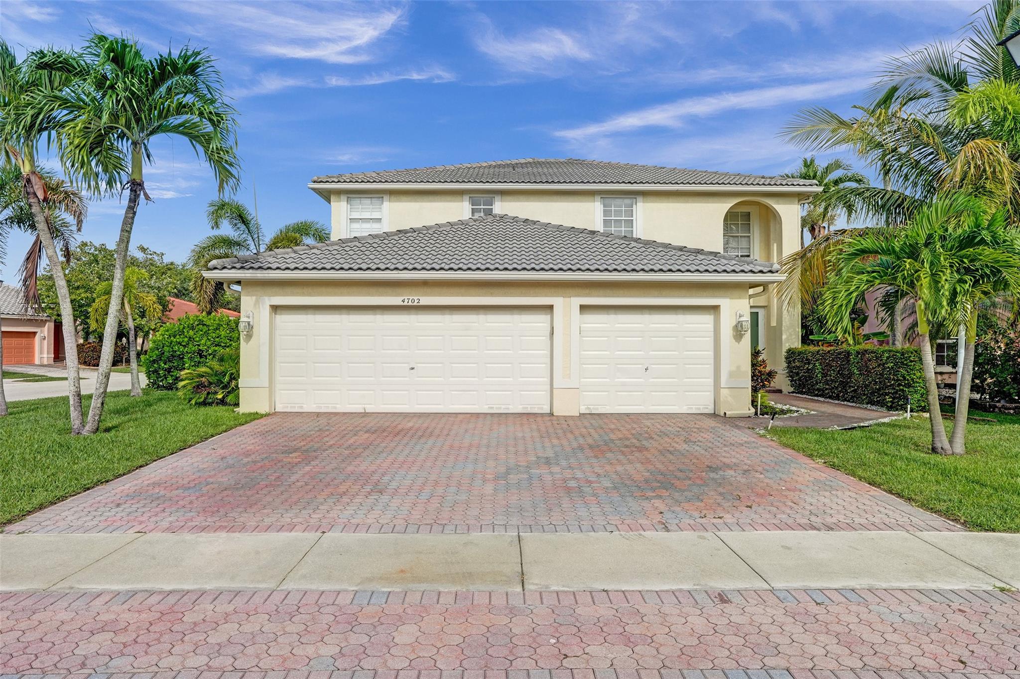 Welcome Home to gated Pelican Trails in Wyndham Lakes in desirable North West Coral Springs and very low HOA fees which includes gate access and lawn care. This beautiful 5 bedrooms, 4 bathrooms, 3 car garage, pool home is situated on a corner lot. The home is just shy of 3,000 sq feet, double frosted glass front doors greets you, one bedroom and bath is located on the first floor, back door sliders are hurricane rated. Oversized primary suite with sitting area, laminate floors upstairs all of the bathrooms has been updated. The tranquil private back yard with a large pool with child fence and grassy area with tropical fruit trees, lush hedges for extra privacy. Close proximity to highways, shopping, excellent schools and parks. Priced at a bargain! Four point inspection attached to MLS.