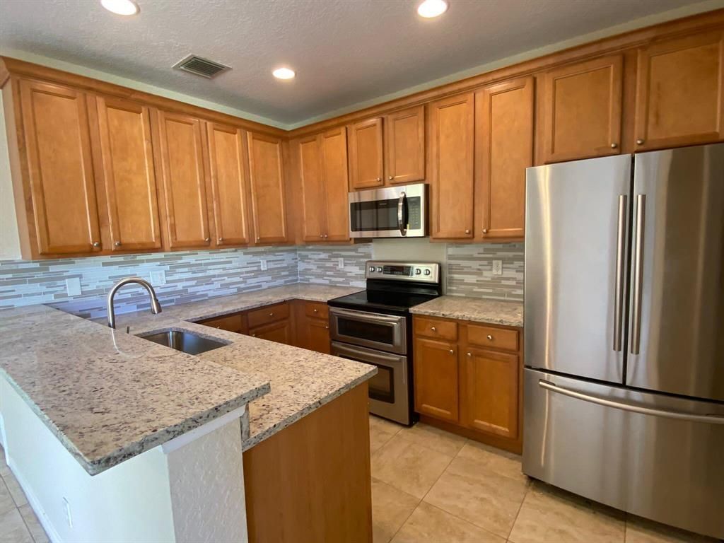 Photo of 1912 SE Grand Drive, Port Saint Lucie, FL 34952 (MLS # R10737530)