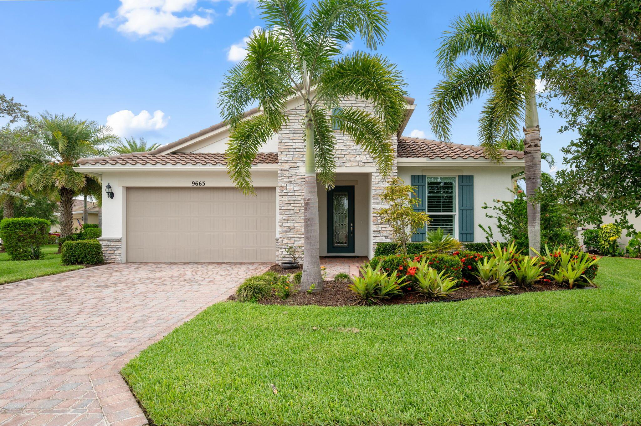 This beautiful one level home is situated on a corner lot - one of the largest and most desirable preserve home sites in Vitalia. Featuring two bedrooms + a den/office and 2 full baths, the expansive floor plan includes a gourmet kitchen, high ceilings, and 8' high doors. Truly a must-see, the large screened + paver lanai looks out on beautiful water lilies and is perfect for entertaining! Crown molding, high baseboards, porcelain tile and custom shutters are just some of the interior designer touches throughout the home. The kitchen includes a spacious walk-in pantry (6' x 8'), and the owner's bedroom/bath suite has a walk-in closet (8' x 9'), and large, open walk-in shower. The home is built with concrete block construction, tile roof and PGT impact resistant glass. These are re