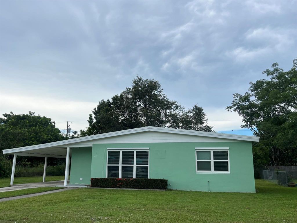 Photo of 115 SE Lucero Drive, Port St Lucie, FL 34983 (MLS # R10901681)