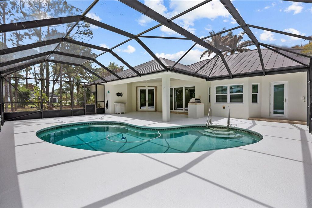 Photo of 2005 SW Amarillo Lane, Palm City, FL 34990 (MLS # B26012800)