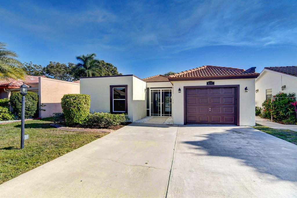 Photo of 8397 Bonita Isle Drive Dr, Lake Worth Beach, FL 33467 (MLS # R10690170)