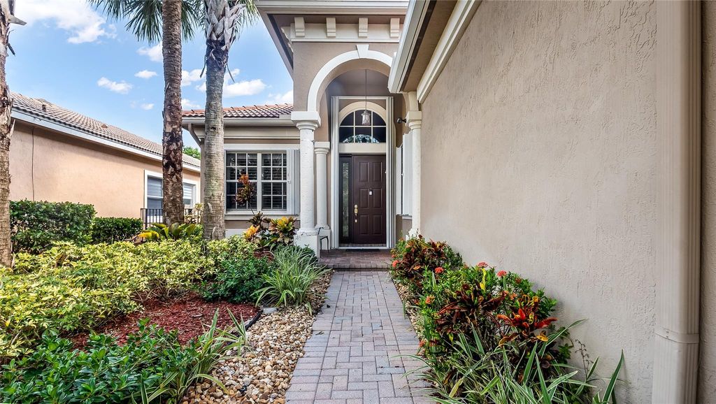 Photo of 12430 NW 78th Mnr, Parkland, FL 33076 (MLS # F10523049)