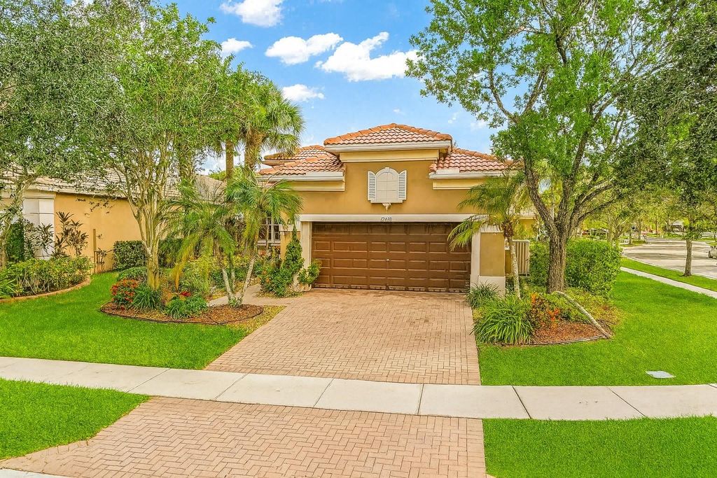 Photo of 12430 NW 78th Mnr, Parkland, FL 33076 (MLS # F10523049)