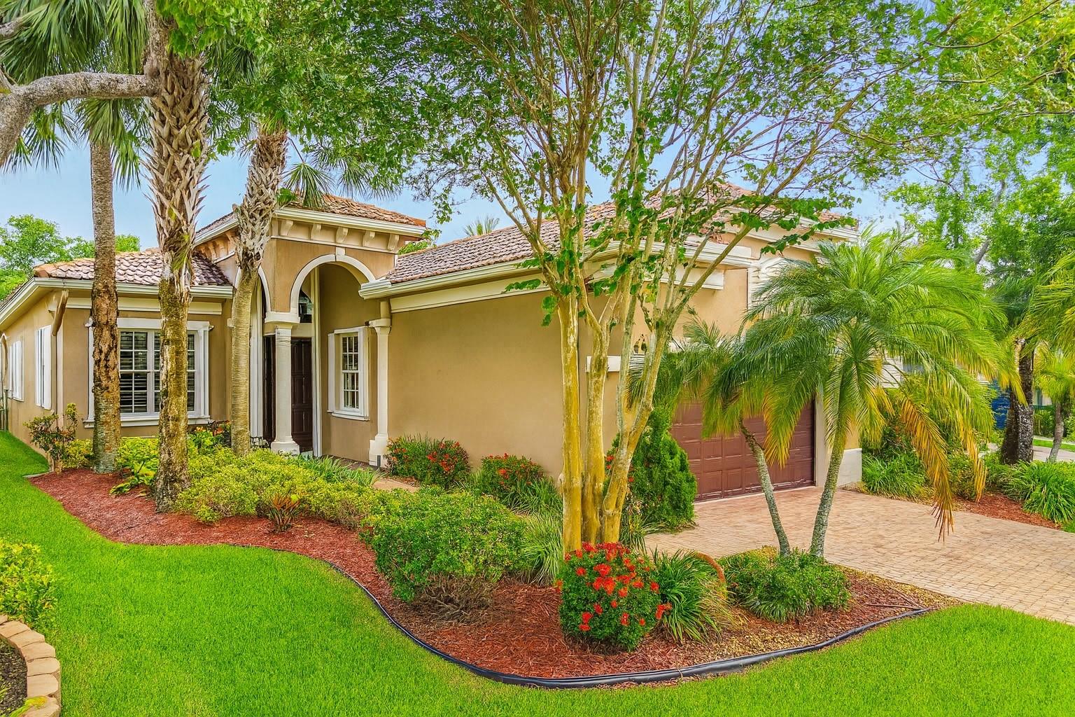 Beautiful one-story 3BR/2BA home in Heron Cove of Heron Bay. Featuring: updated kitchen, light cabinetry, high ceilings, open floor plan & abundant natural light. Spacious living & dining areas flow to a private screened porch & professionally landscaped fenced corner lot. The primary retreat has double entry doors & separate from other bedrooms, custom closets, wood floors, & a remodeled bath. Additional highlights include wood flooring in bedrooms, remodeled 2nd bath, ceiling fans, accordion shutters, & newer A/C. Walk to the clubhouse w/ resort-style pool, new pickleball courts, tennis center, basketball, & state-of-the-art fitness facility. Zoned for A+ schools, this bright residence combines comfort & an unbeatable Parkland lifestyle. Guard gated community with lawn care included!