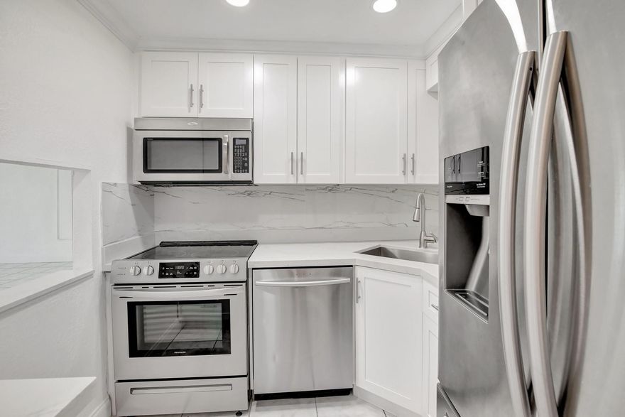 This stunning one bedroom, one bathroom corner unit in the prestigious 55+ community of Sunrise Lakes has been tastefully updated and is ready for immediate move-in. Featuring tile flooring throughout, a custom-built kitchen with sleek quartz countertops and high-end stainless steel appliances, this home perfectly blends style and functionality. The bright, open layout is complemented by modernized bathroom and a serene view of the lake. This home also features new 2024 AC and water heater. Enjoy resort-style amenities, including a clubhouse, courtesy bus, pools, tennis courts, and more. Maintenance conveniently covers cable, water, and trash.