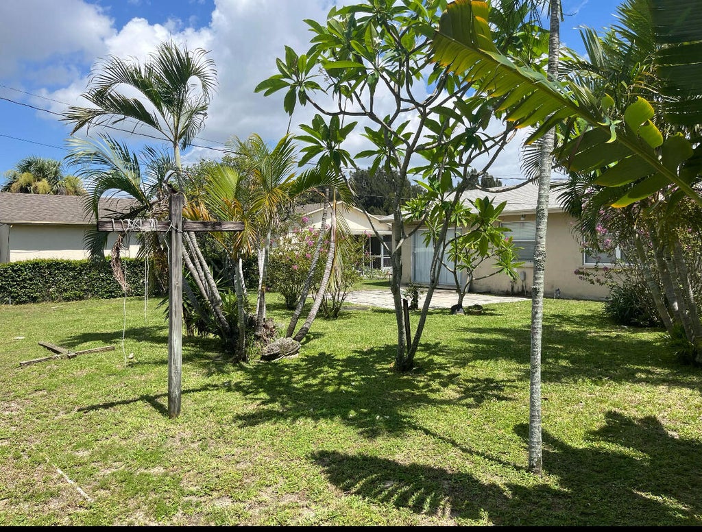 Photo of 1211 W 27TH Street, Riviera Beach, FL 33404 (MLS # B26070231)