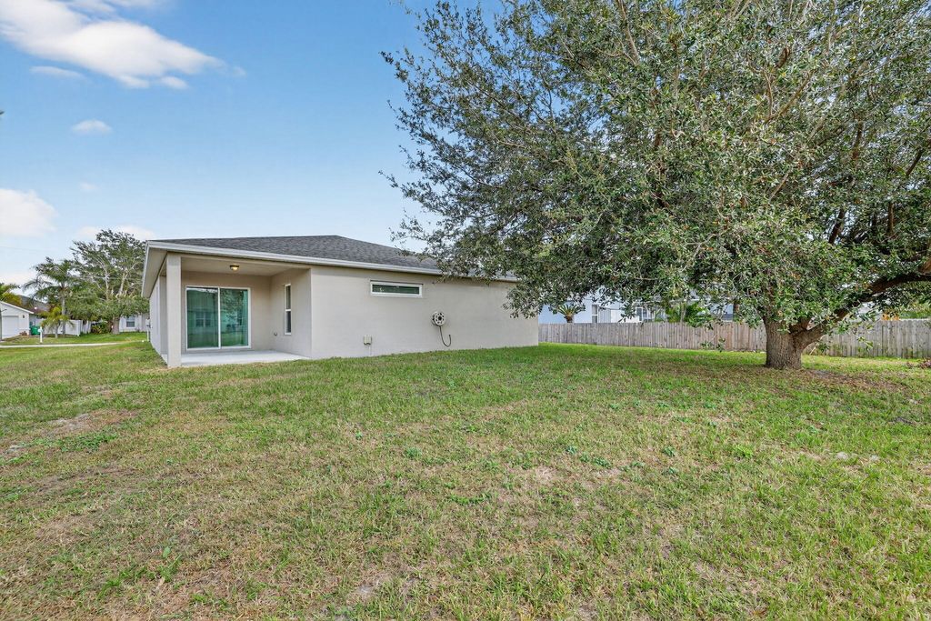 Photo of 418 SW Fields Avenue, Port Saint Lucie, FL 34953 (MLS # R11141977)