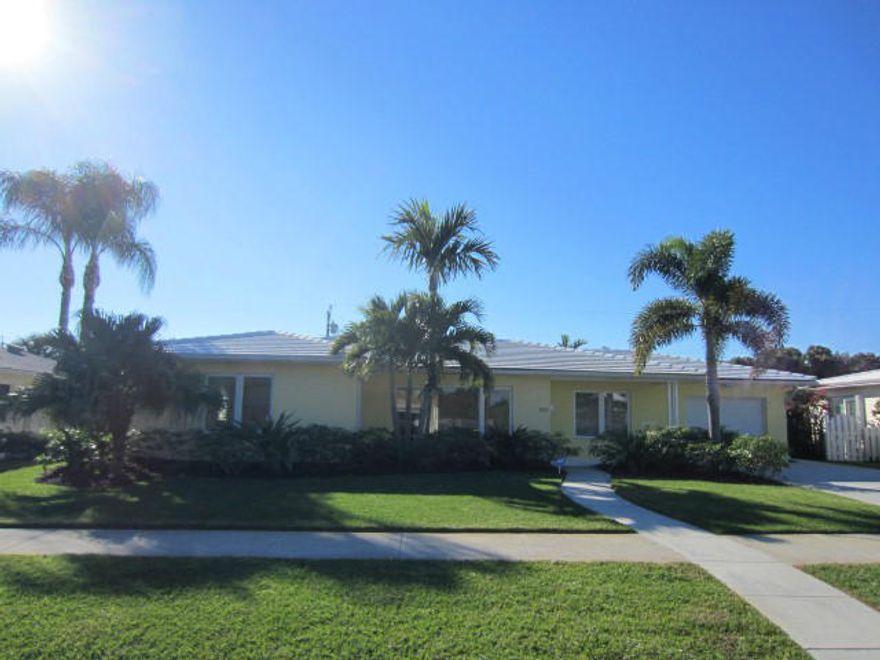 Super Clean Spacious College Park Beauty in most desirable Location. Lake Block. Hardwood Floors, move in ready, all impact windows and doors, Updated kitchen all new appliances,Concrete tile roof, Beautifully landscaped lot with completely private back yard large enough for a pool. Concrete patio runs length of home and is 69x14 with footers built in for purposes of addition (plans transfer to buyer).Third bedroom closet was removed as used as a den currently. Vacant EZ show.