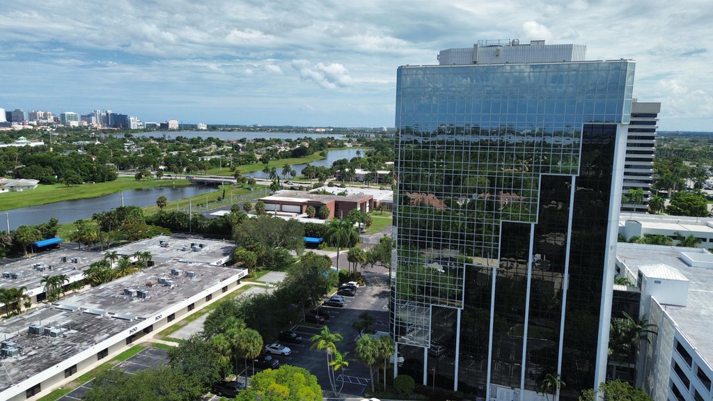 Photo of 1700 EMBASSY Drive #408, West Palm Beach, FL 33401 (MLS # B26060296)