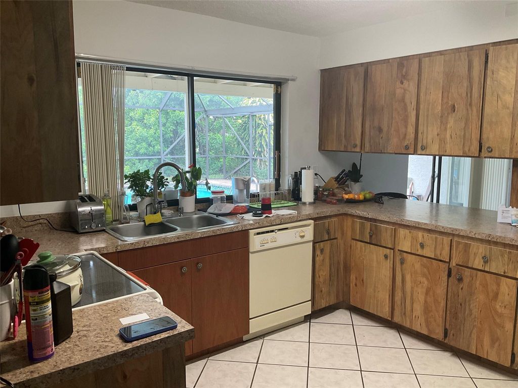 Photo of 6269 Woodbury Road, Boca Raton, FL 33433 (MLS # F10555405)