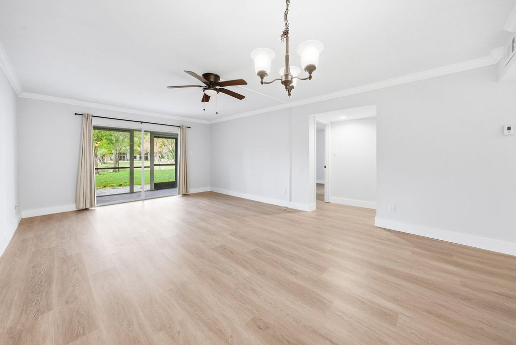 Photo of 2214 S Cypress Bend Drive #106, Pompano Beach, FL 33069 (MLS # F10545399)