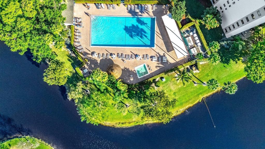 Photo of 2214 S Cypress Bend Drive #106, Pompano Beach, FL 33069 (MLS # F10545399)