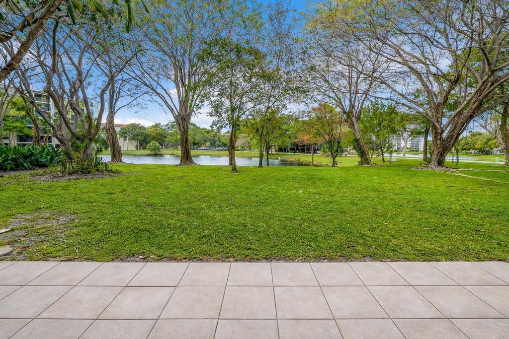 Photo of 2214 S Cypress Bend Drive #106, Pompano Beach, FL 33069 (MLS # F10545399)