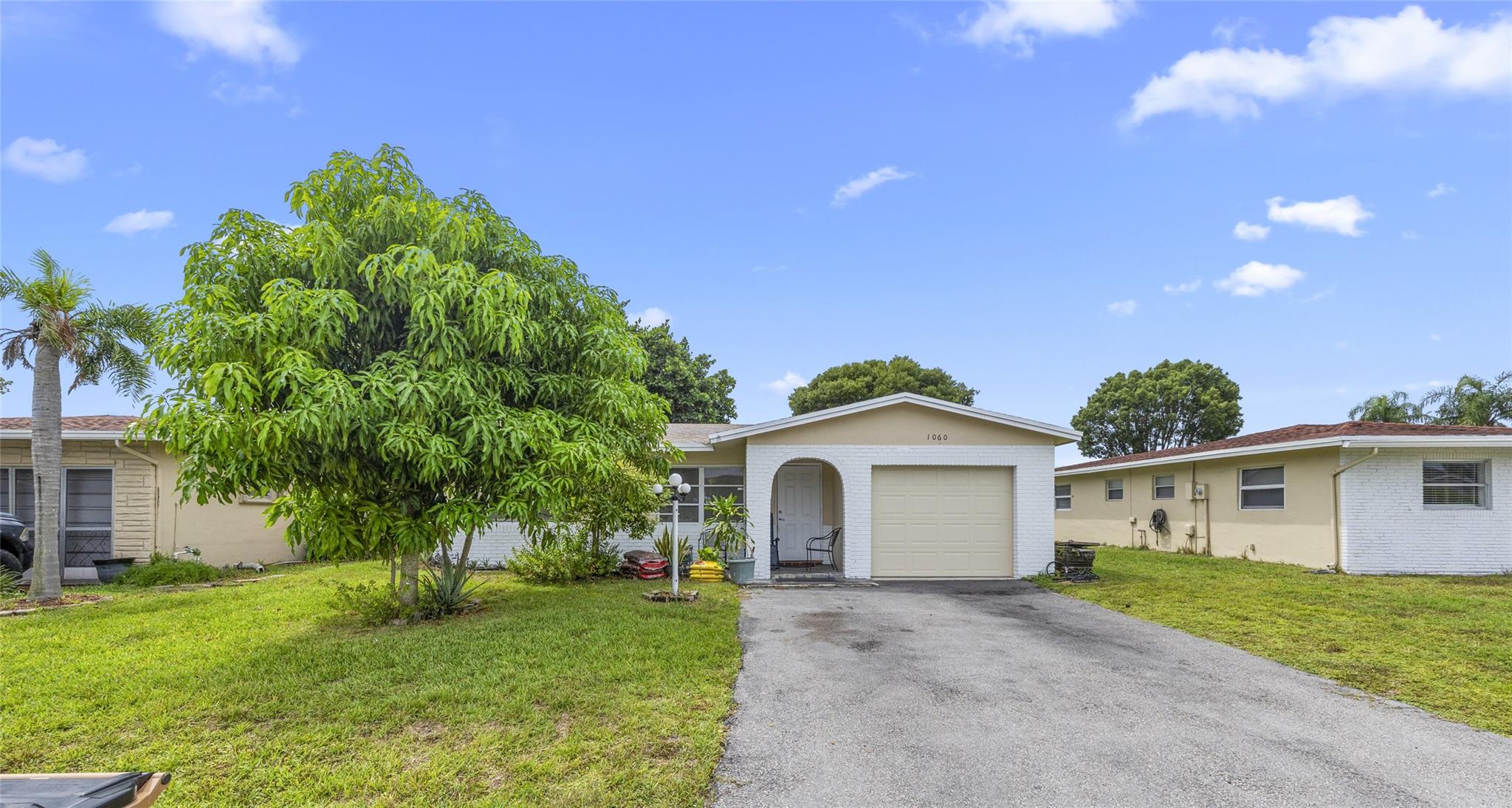 Discover the perfect blend of comfort and convenience in this fully renovated home, ideally situated between I-95, the Turnpike, and Sawgrass Expressway. Roof, AC, and water heater are all less than 5 years old. Inside, you'll find a charming 3-bedroom, 2-bath with a large kitchen area complete with stainless steel appliances and quartz countertop. The layout features elegant tile and wood laminate flooring and plenty of windows. Enjoy a well-rounded active lifestyle with access to community amenities including a pool, clubhouse, gym, and more. One of the lowest HOA in the area. This home qualifies for Down Payment Assistance program with the preferred lender.