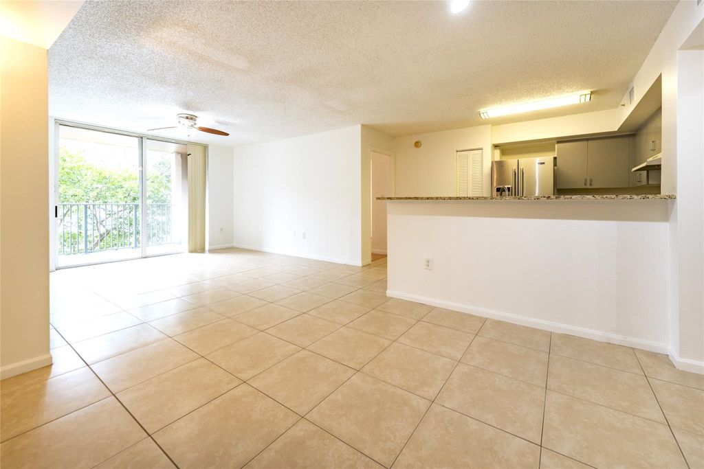 Photo of 4808 N State Road 7 #203, Coconut Creek, FL 33073 (MLS # F10554277)